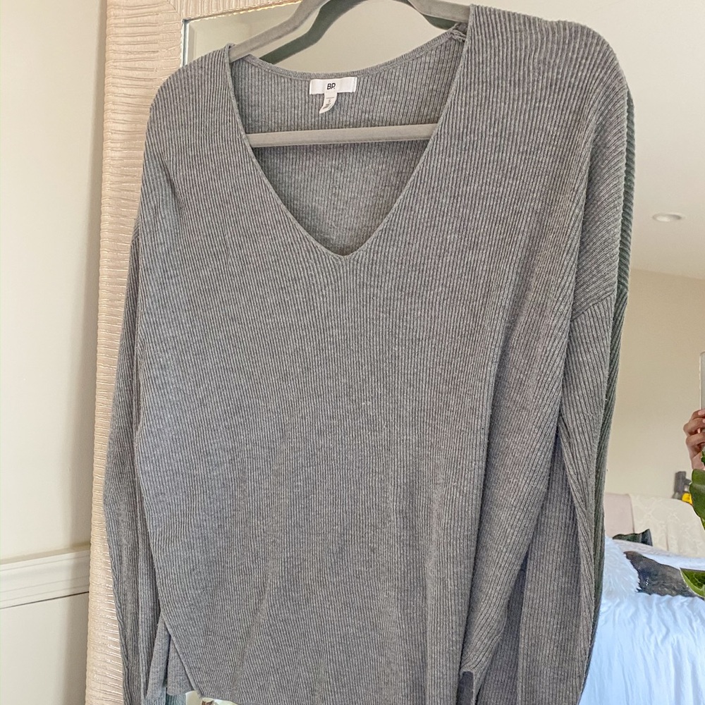 White and Black BP sweaters